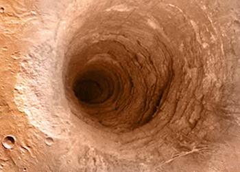 Ученые NASA обнаружили на Марсе огромную дыру и не знают, куда она ведет